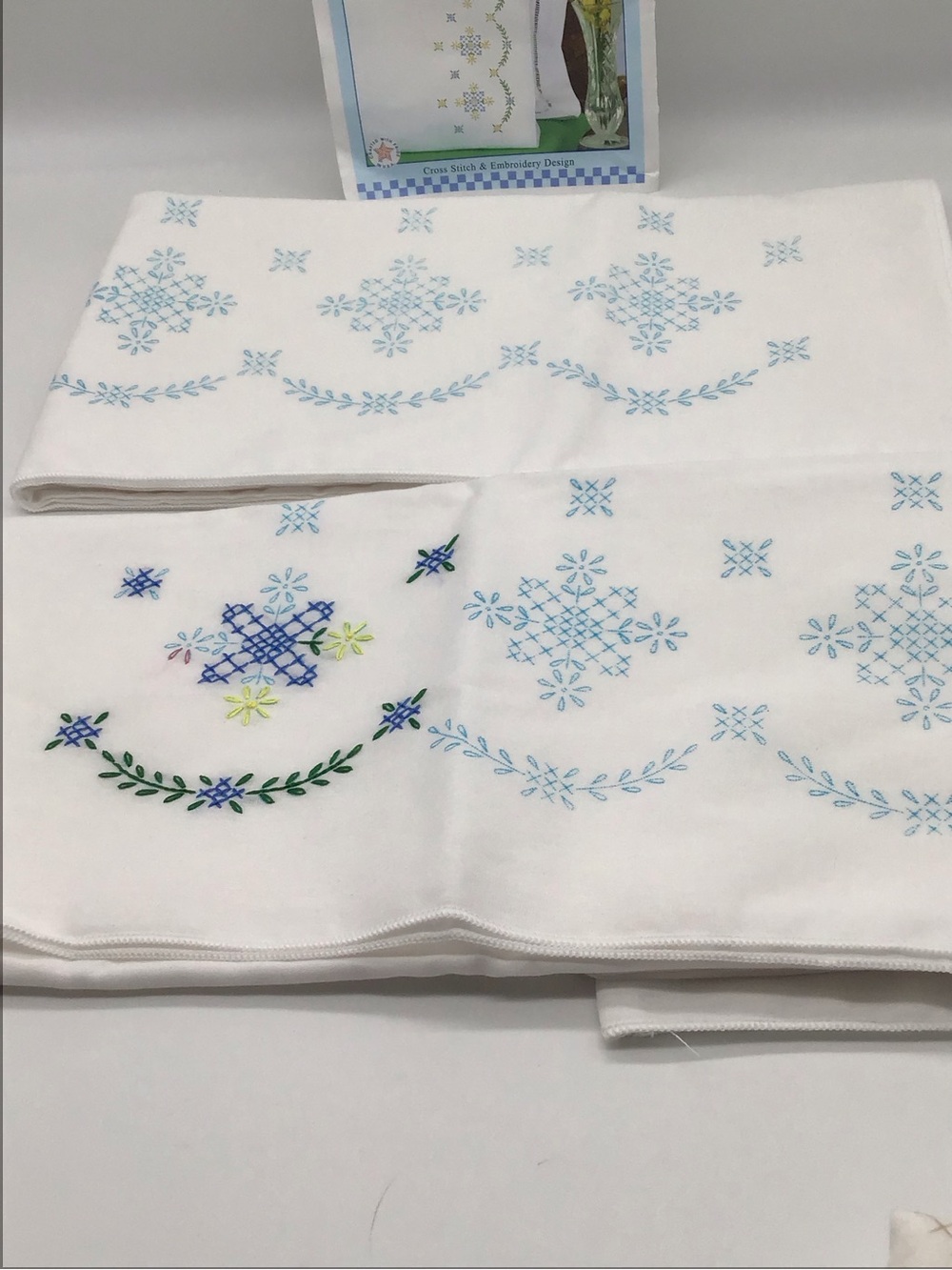 Set of 2 standard size Embroidered Pillowcases with Blue and Green Snowflake